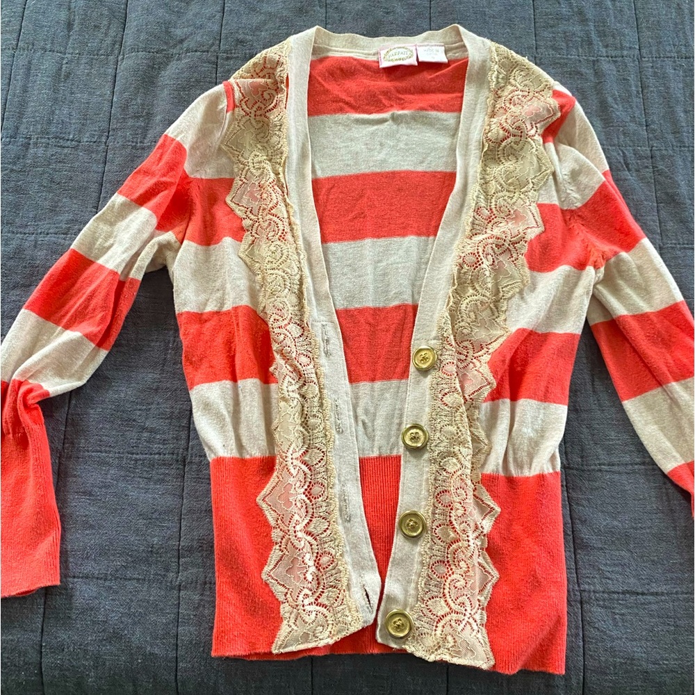 Salmon and gold Parfait cardigan with lace trim and gold buttons